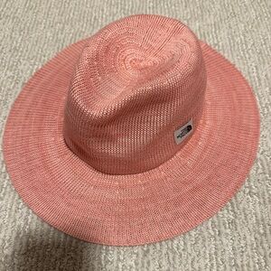 The North Face pink knit hat size small/medium. Women’s hat